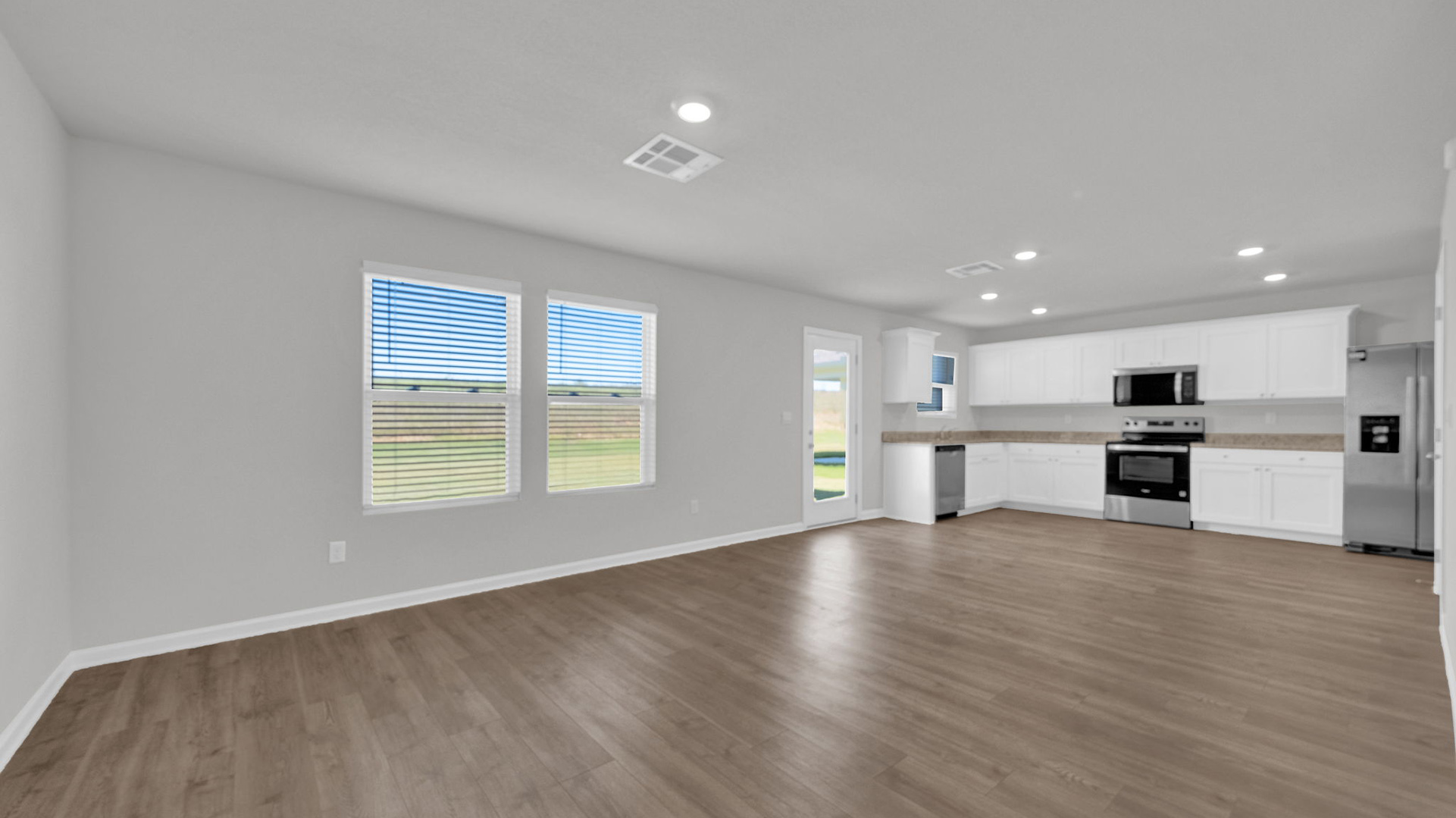 Living room opens up at the front door