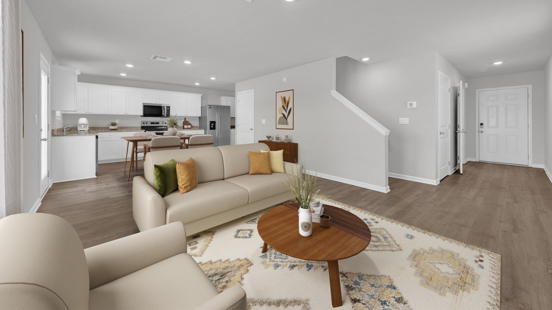 Virtually staged main living area open to one another