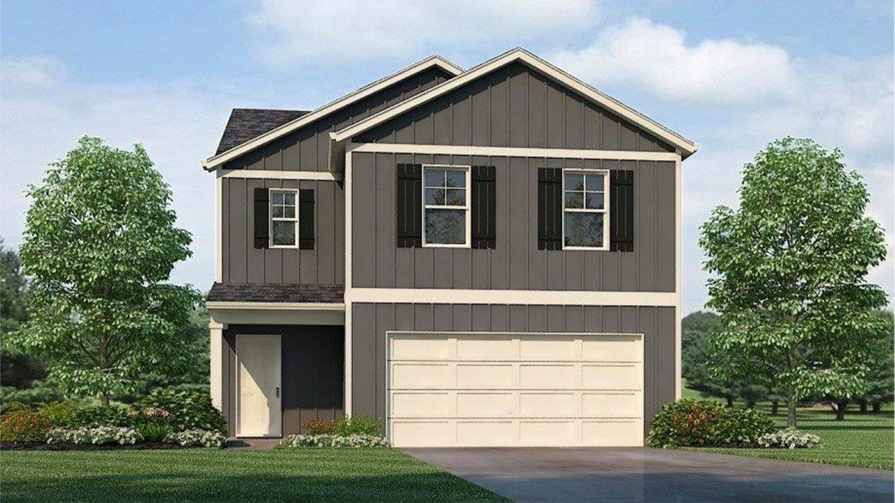 Exterior elevation of the Taylor floorplan, a two story home with a two car garage