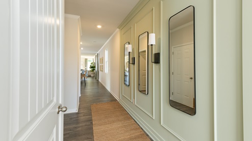 Front door entryway of the Bowen floorplan leading down the long entry hall