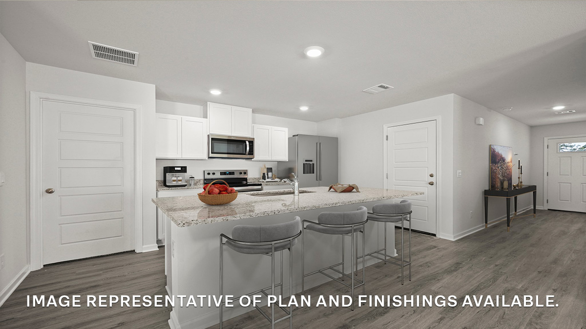 Aspen kitchen virtually staged opens up at the end of entry hall