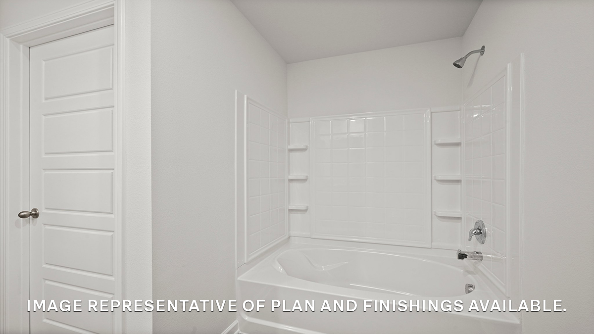 Primary bathroom with a acrylic tub/shower insert