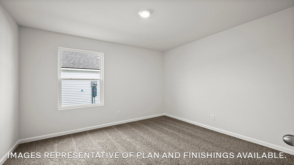 Third bedroom with a single window and neutral paint