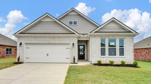 exterior elevation of single story home with a two-car garage in kingston creek community