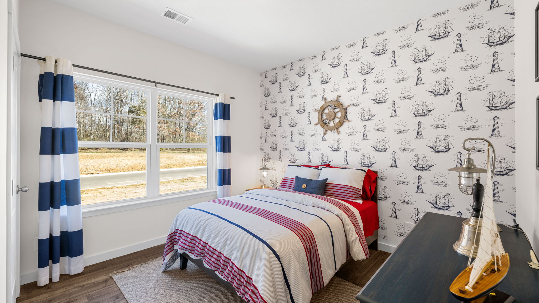 bedroom with double window and walk-in closet