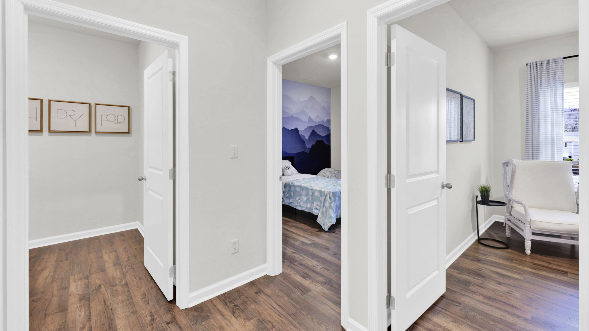 hallway facing bedroom doors