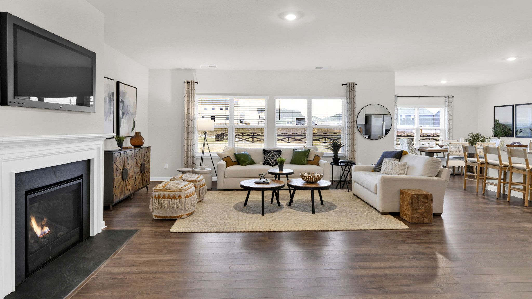 open concept living room with two double windows