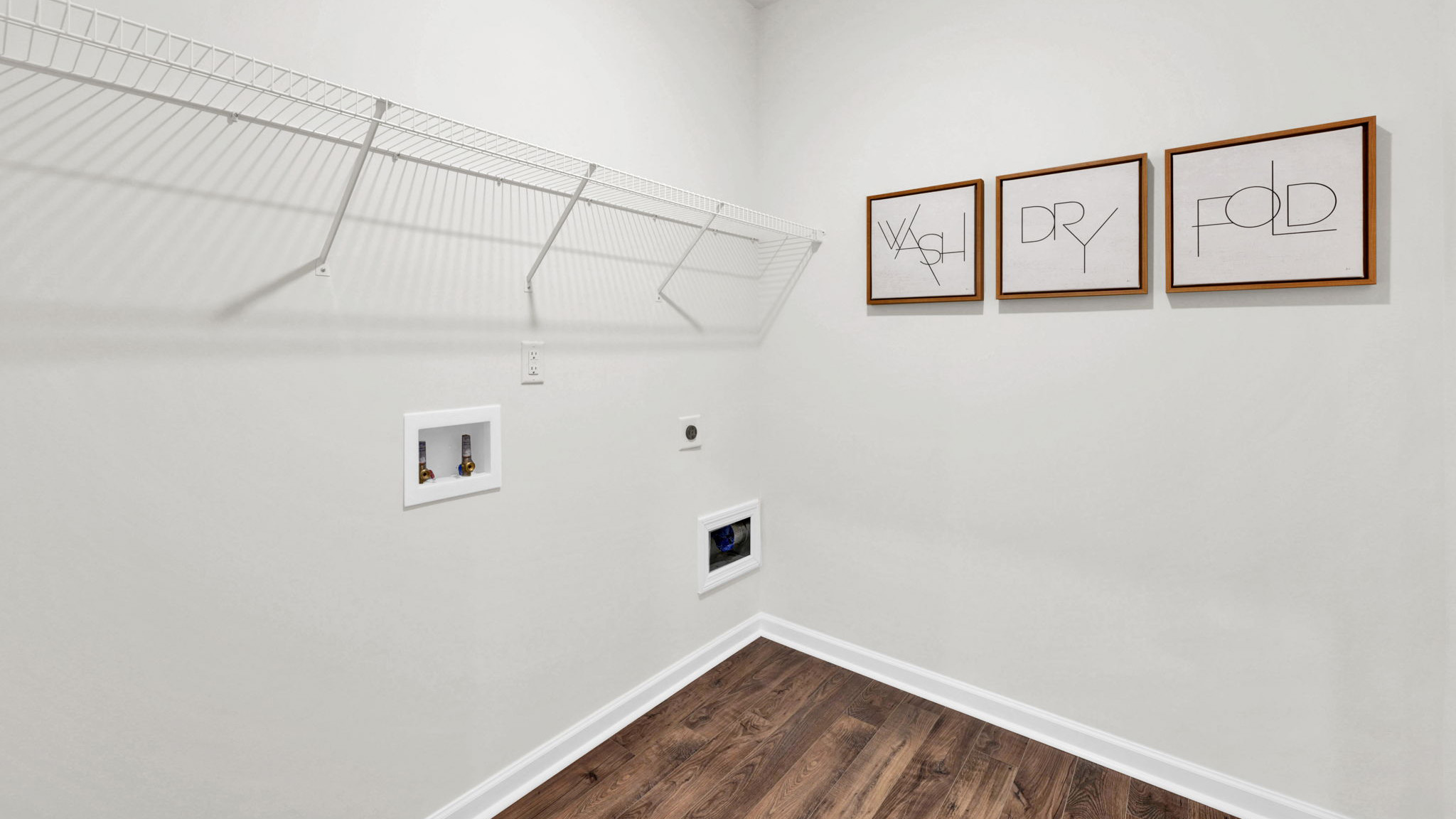 laundry room with shelving