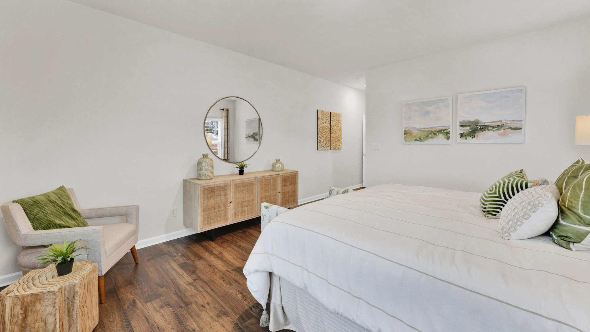 primary bedroom with en suite and windows