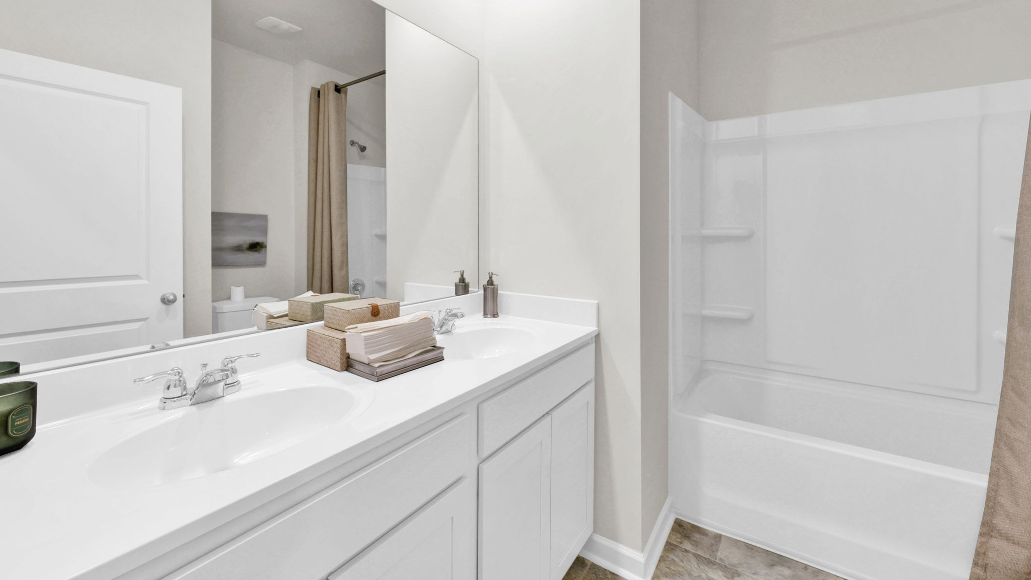 full bathroom with double vanity