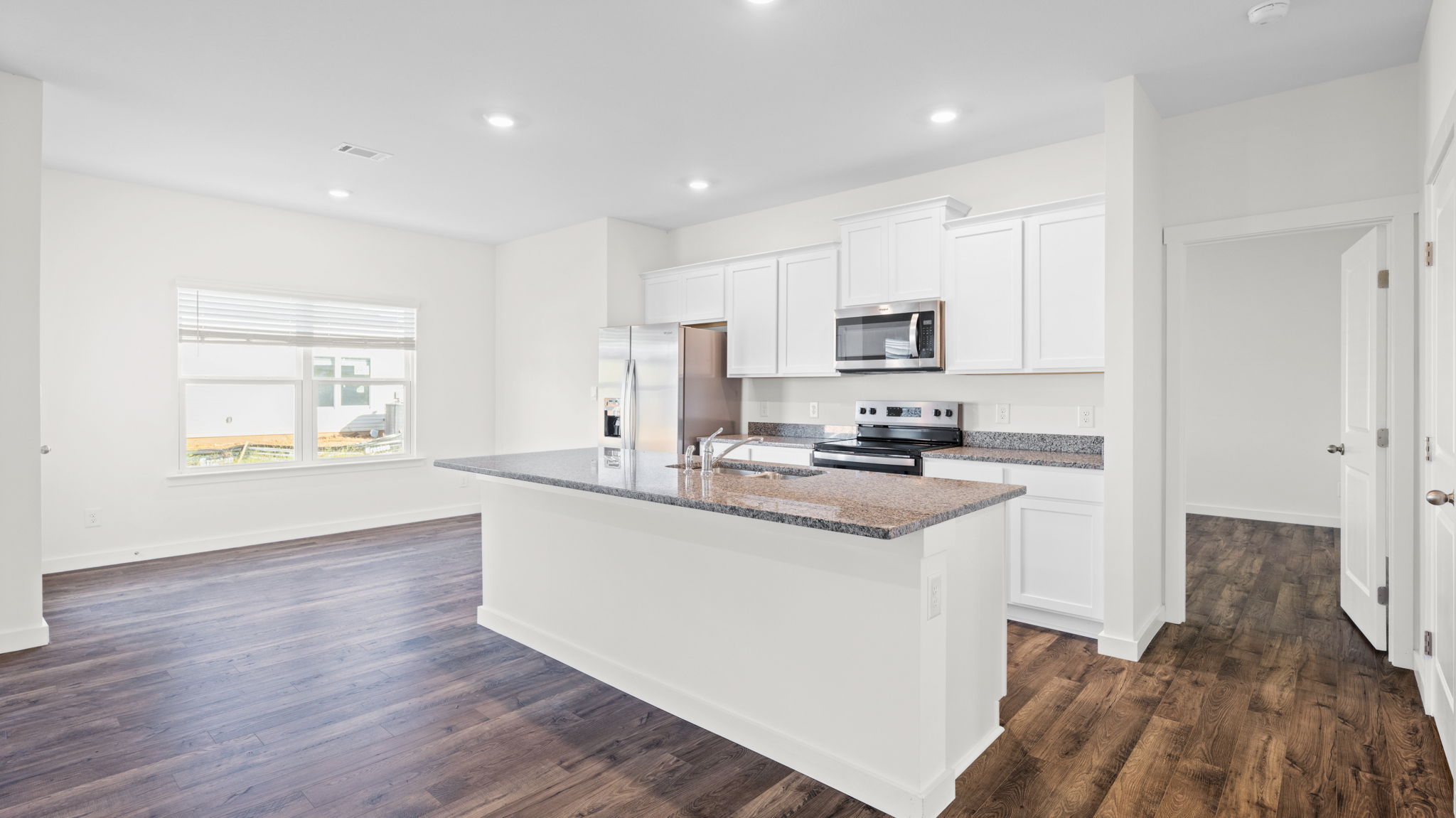 kitchen with large island and stainless steel appliances