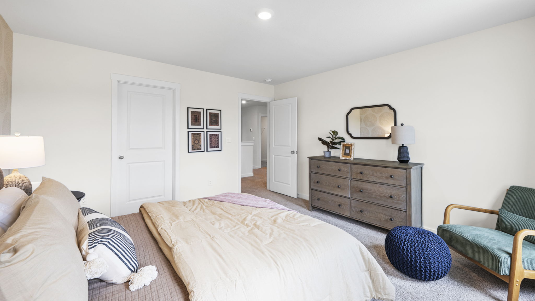 bedroom with two single windows and walk-in closet