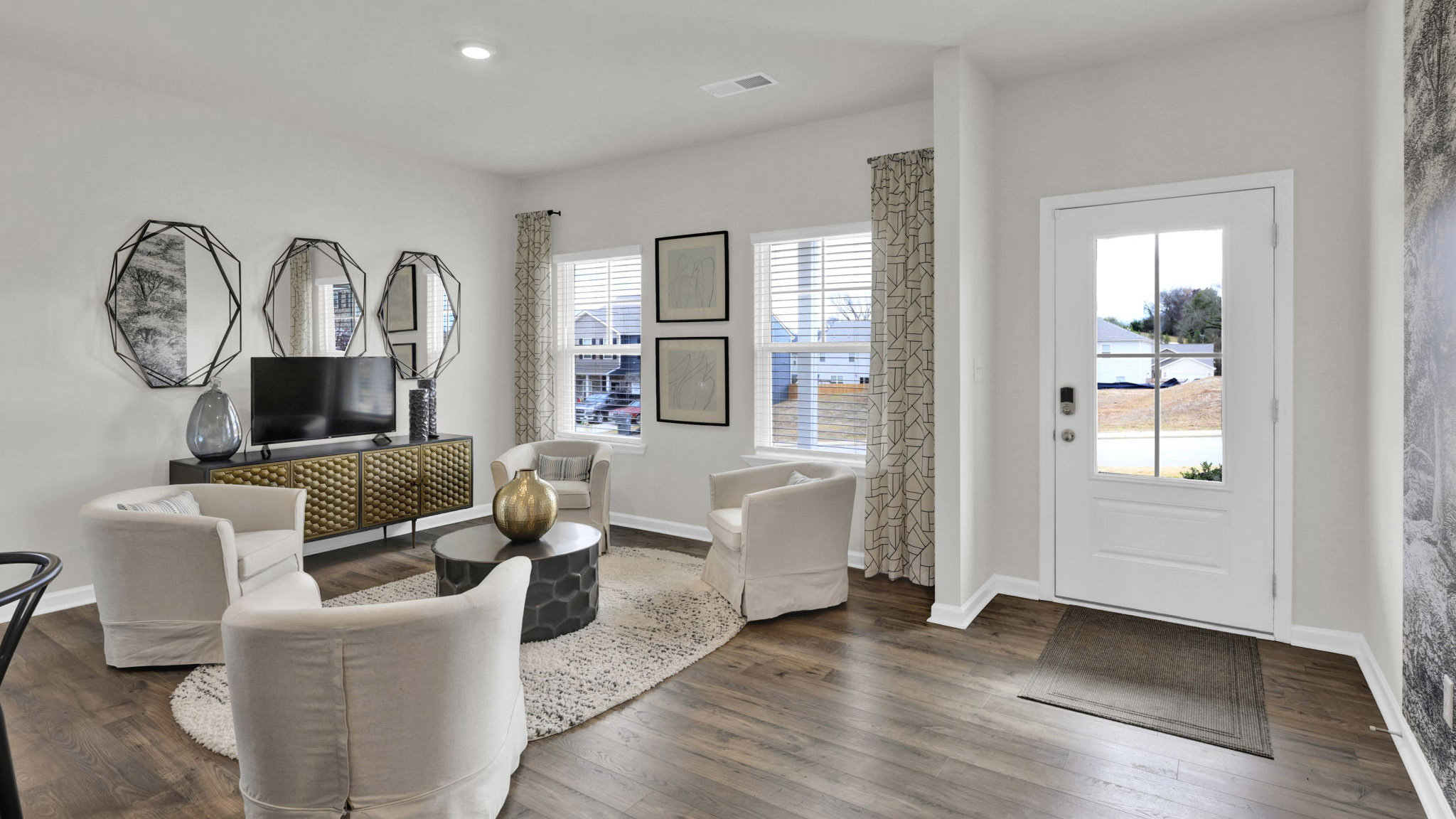 open concept seating area with formal dining area