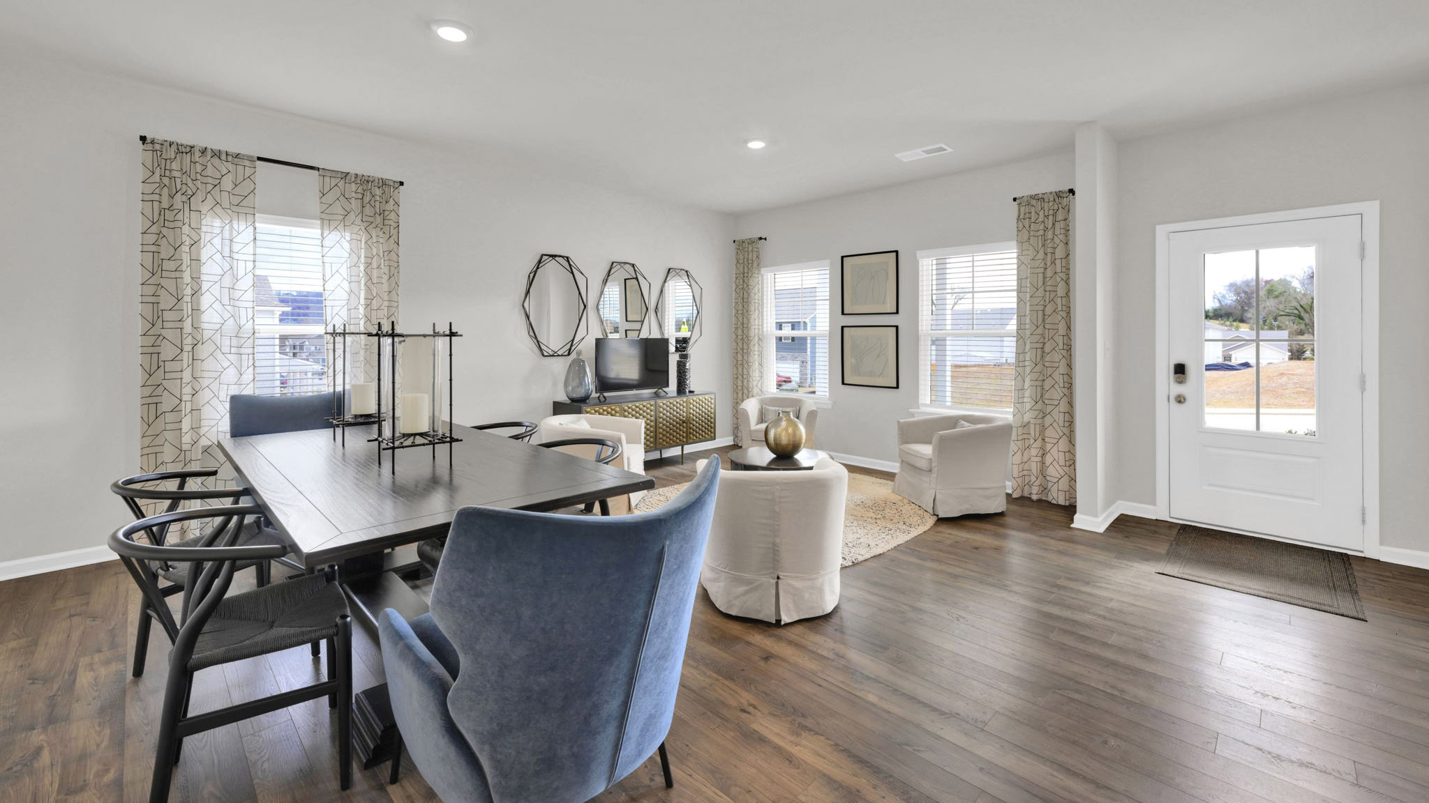 open concept seating area with formal dining area