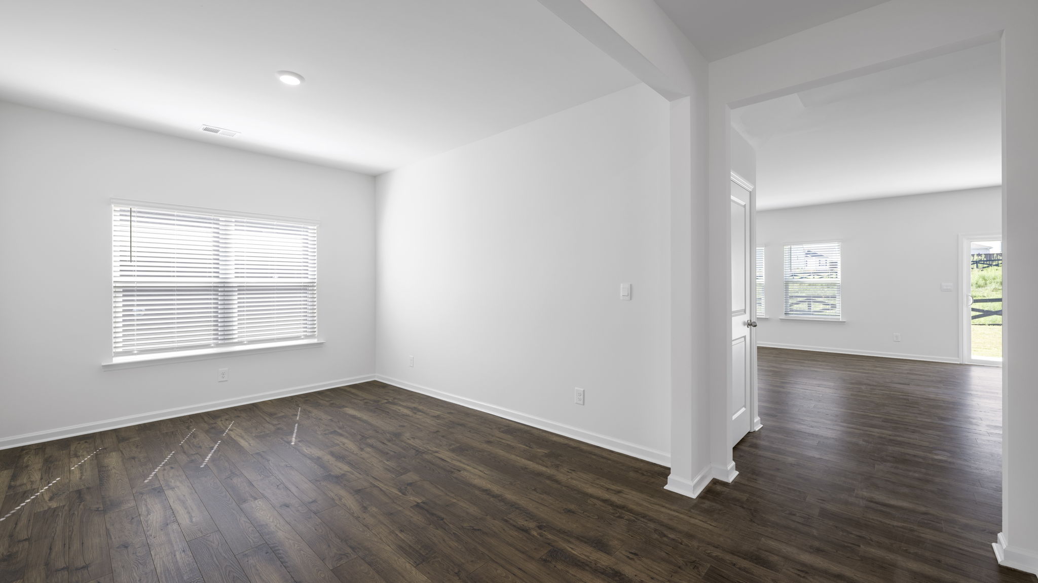 formal dining area with double window