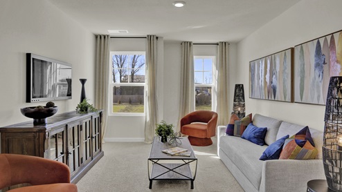 Upstairs loft space with large windows