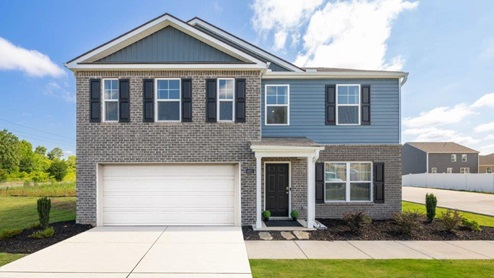 Powell Meadows model home two story home with brick