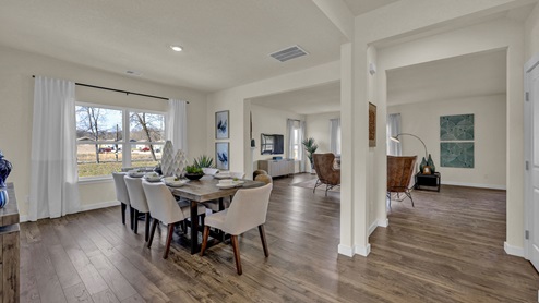 Open concept floor plan with dining room and living space