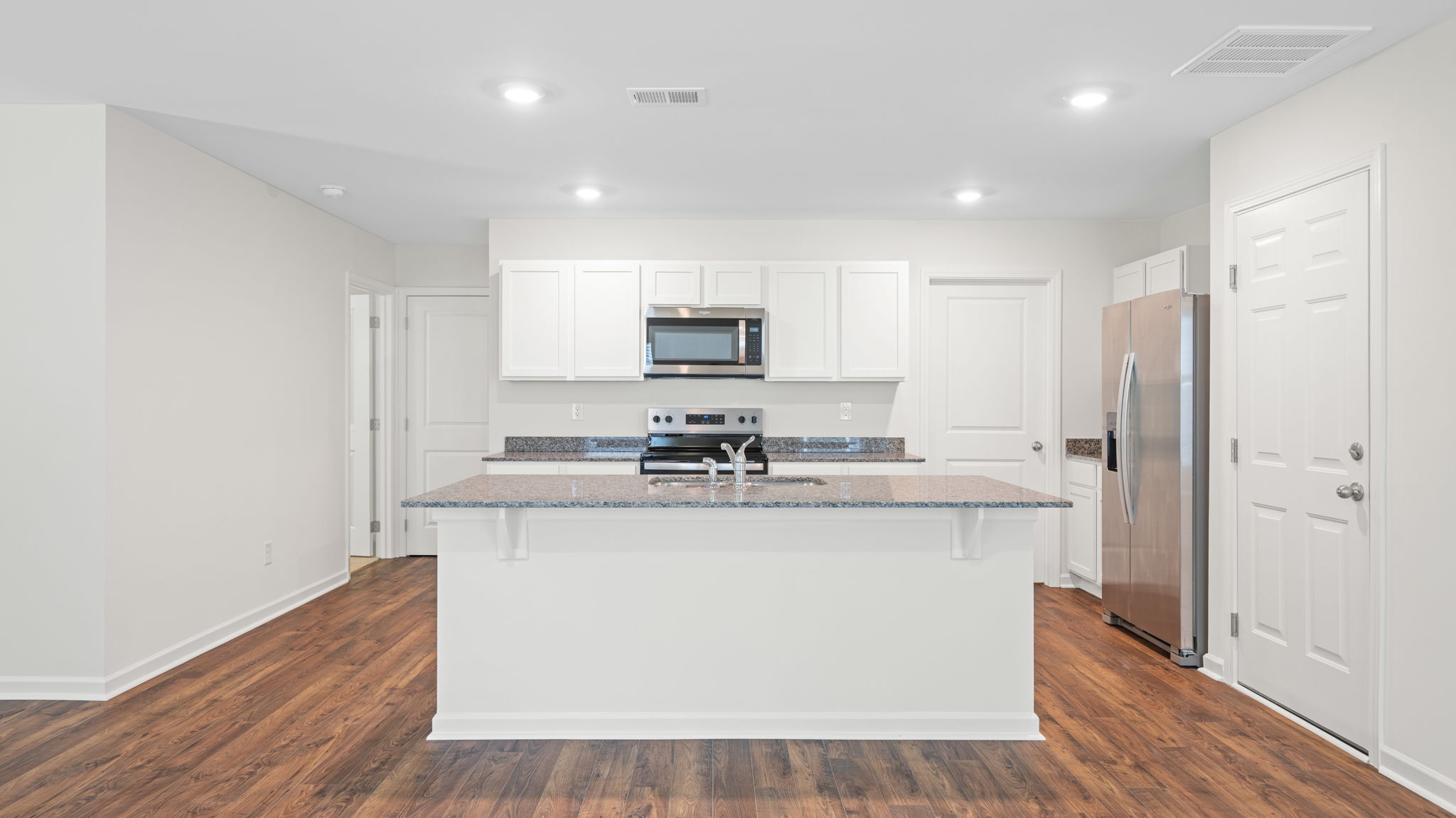 kitchen with large island and walk-in pantry