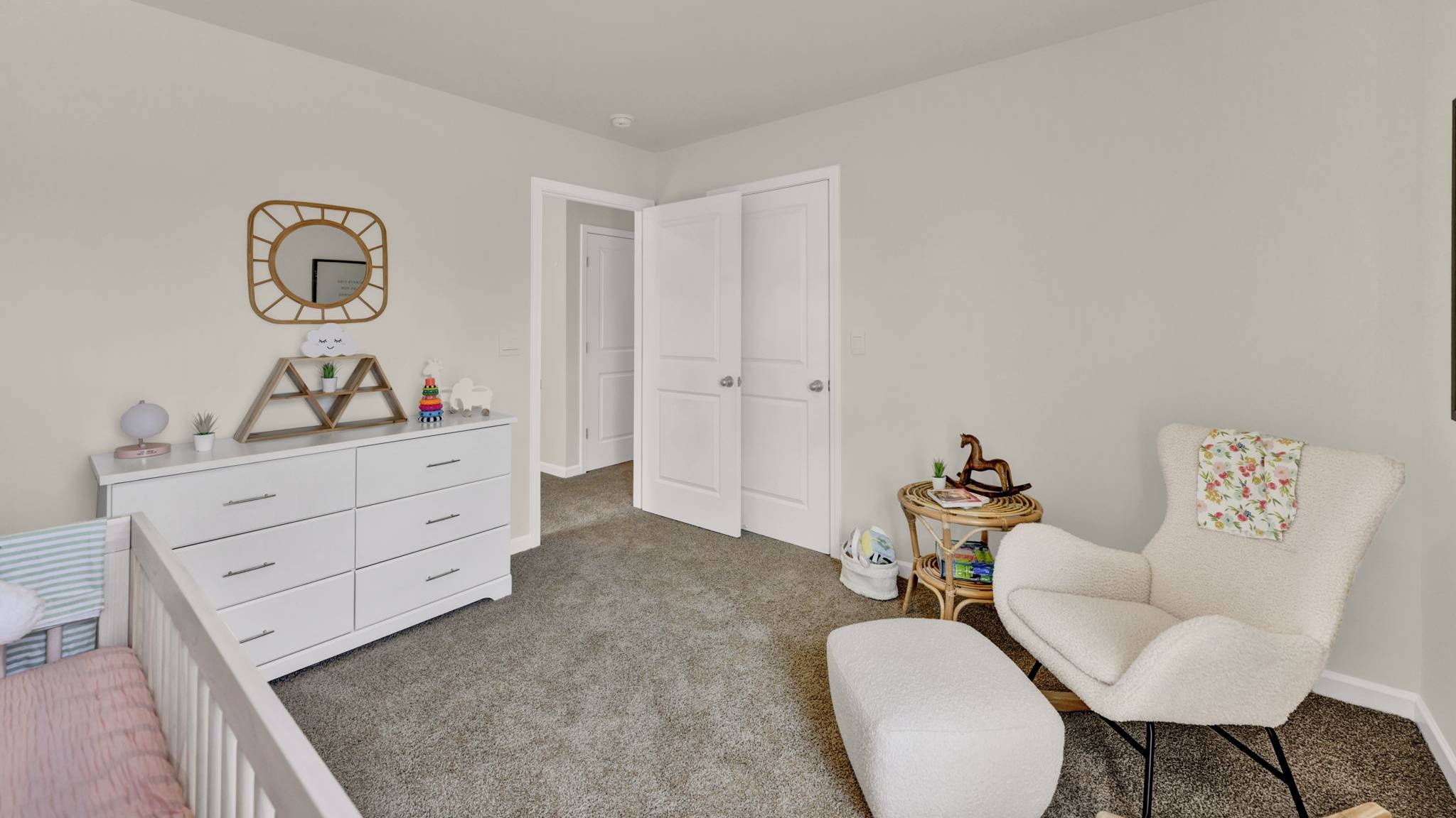 bedroom with dresser and chair