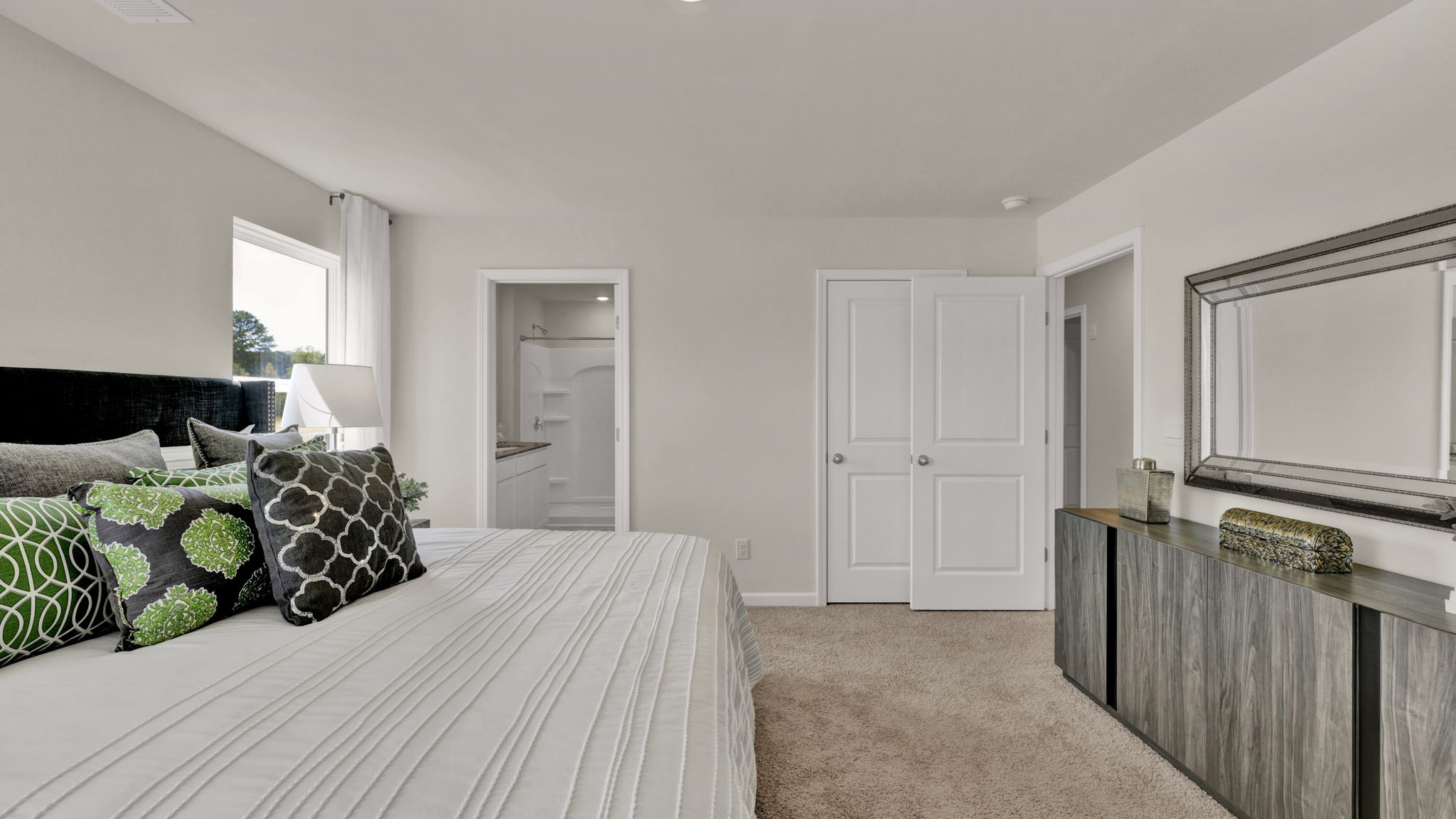 bedroom with two single windows and en suite