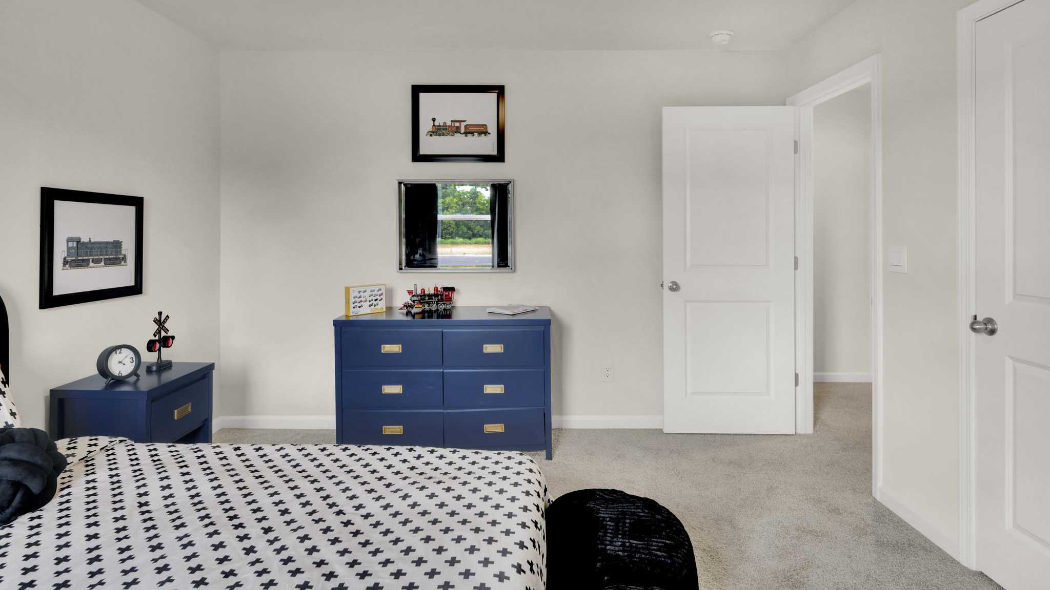 bedroom with single window and walk-in closet