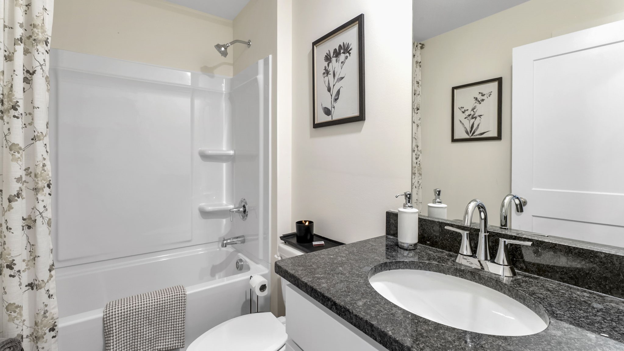 full bathroom with single vanity and shower/ tub duo