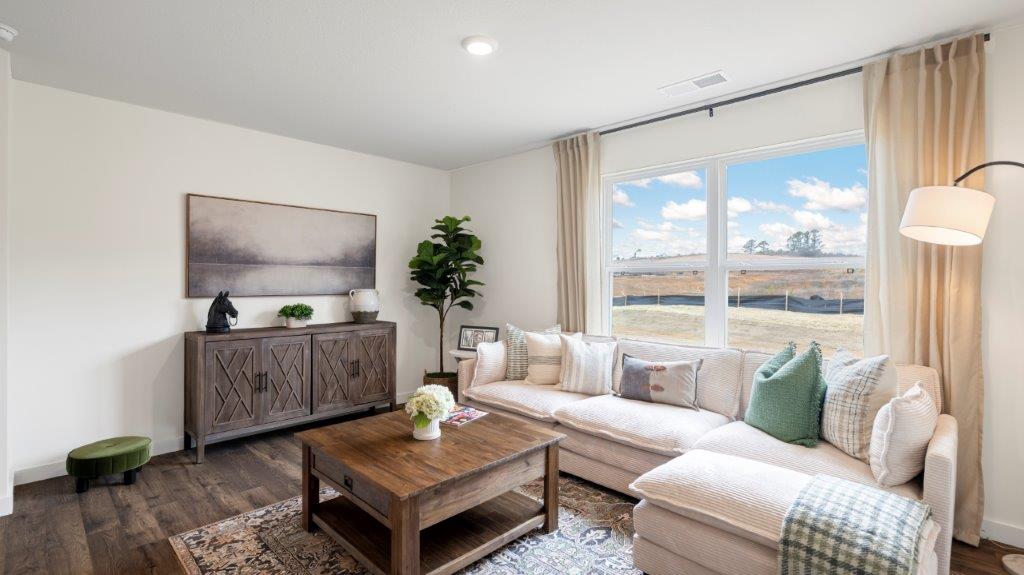 open concept living room with double window