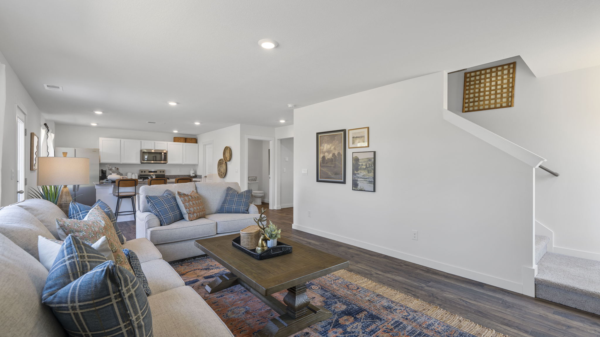 open concept living area with double window
