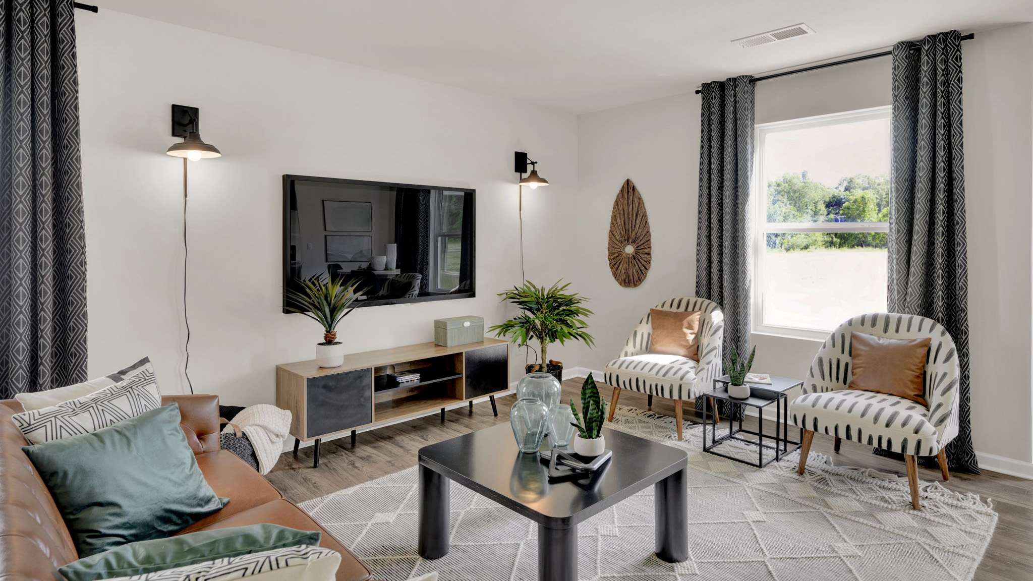 open concept floorplan with kitchen island and living room