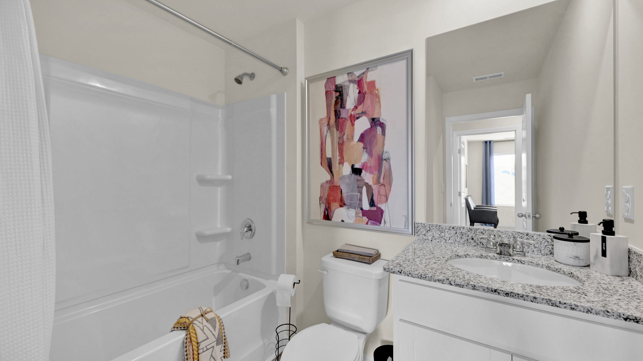 bathroom with tub and shower combination