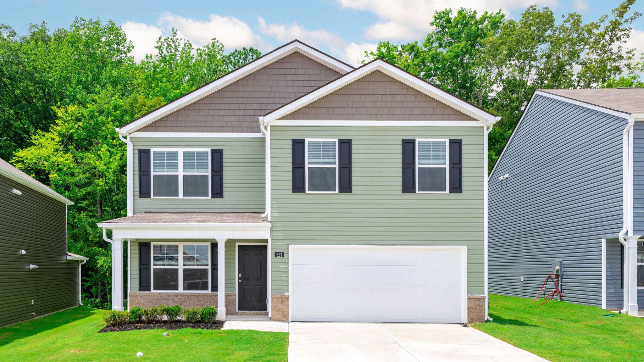 Belhaven is a two story plan with front entry garage.