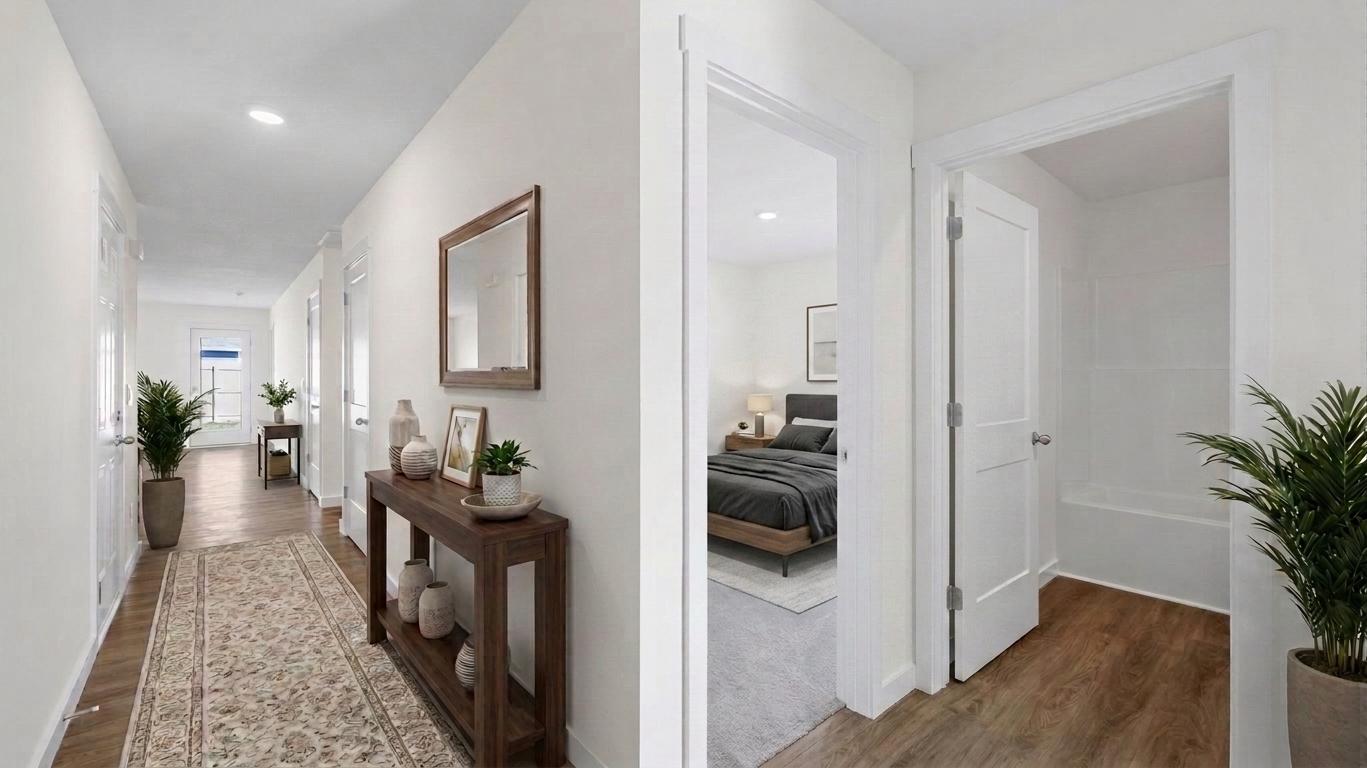hallway leading to bedroom and bath