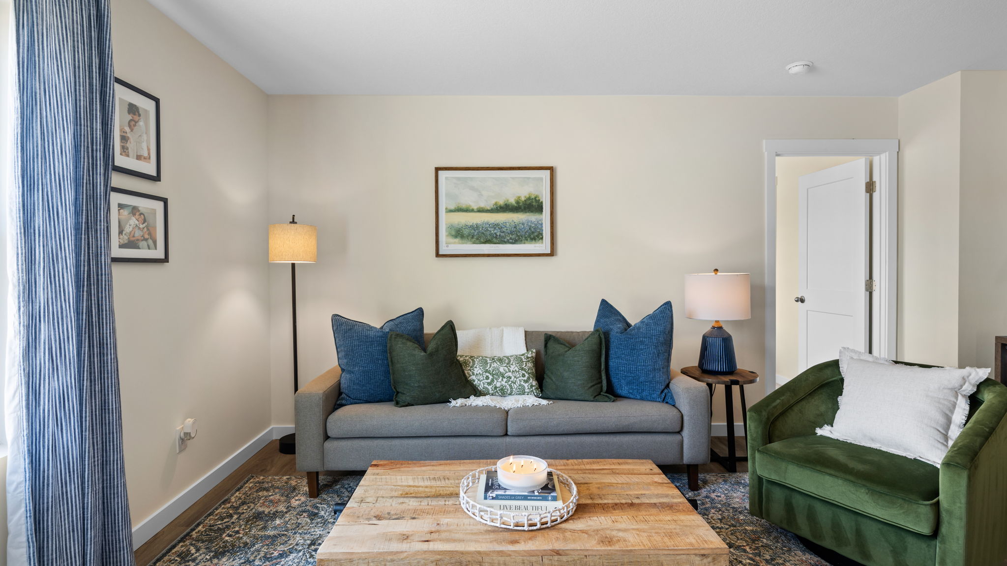 open concept living area with double window