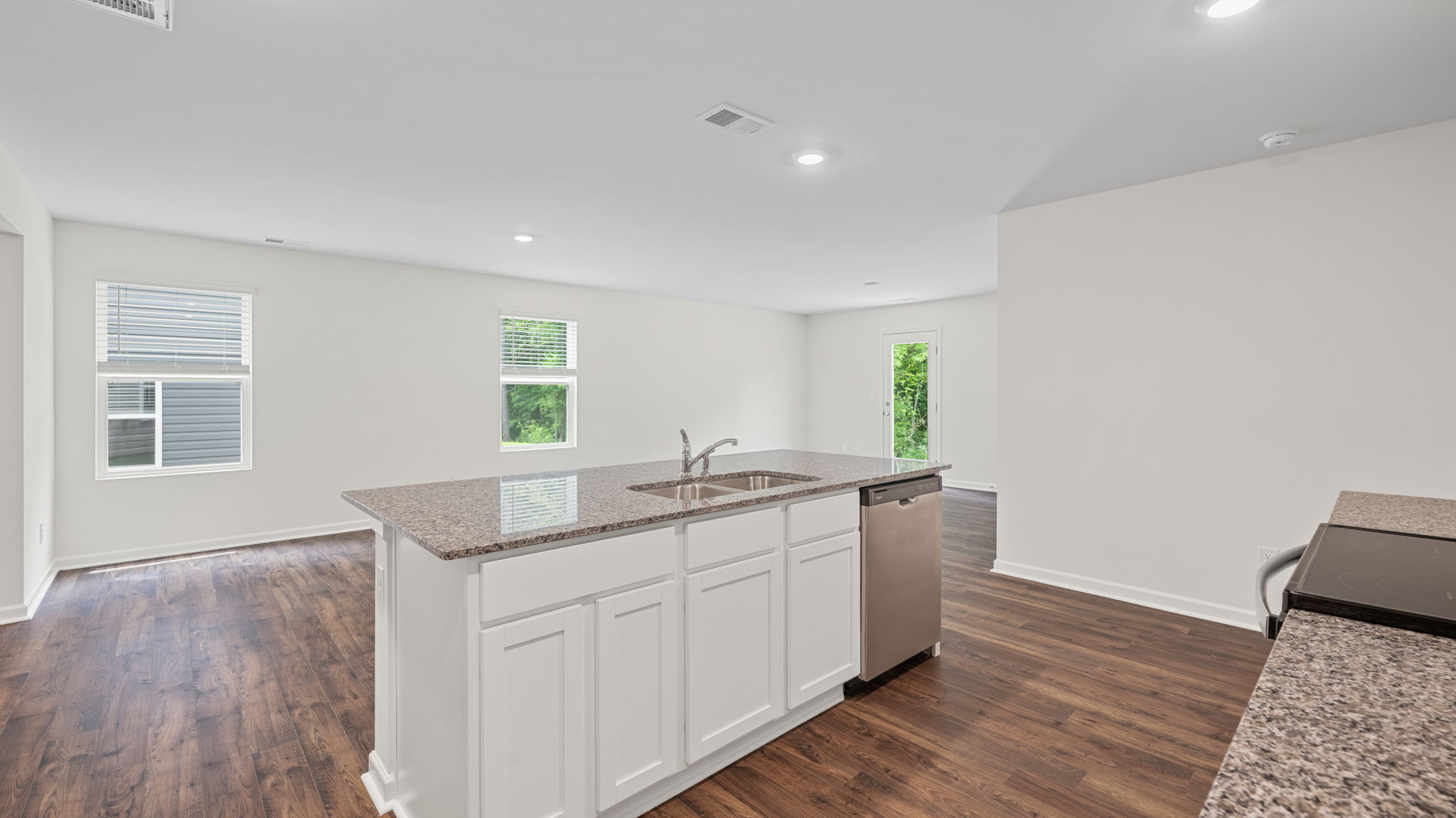 kitchen facing dining and living room