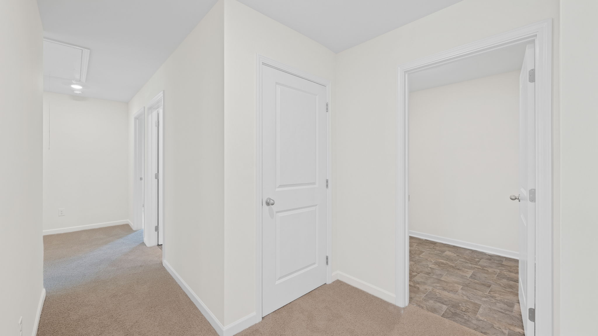hallway with laundry room