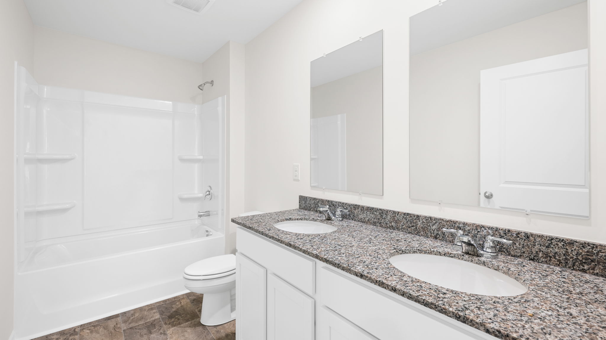 full bathroom with double vanity