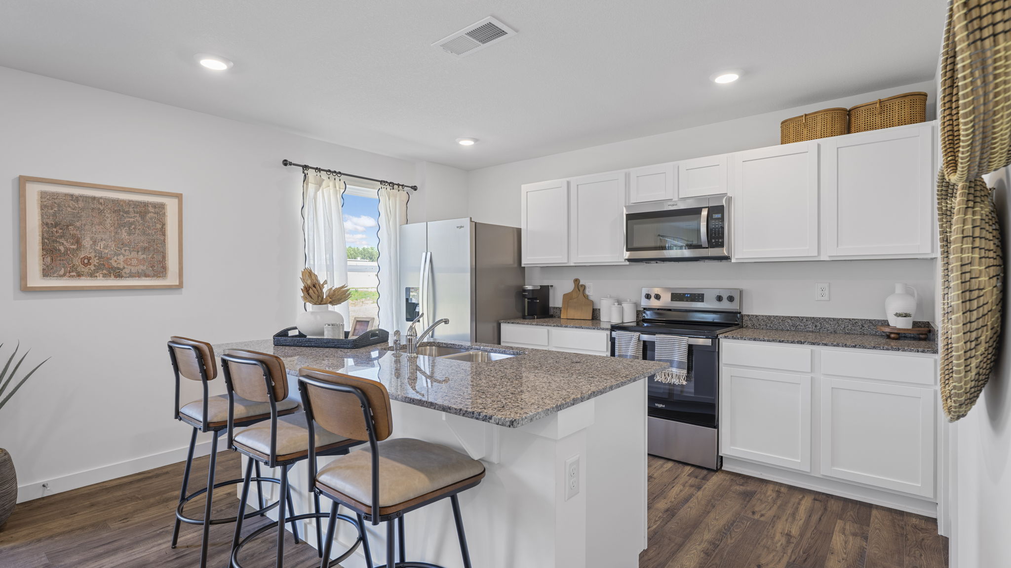 kitchen with large island and bar seating