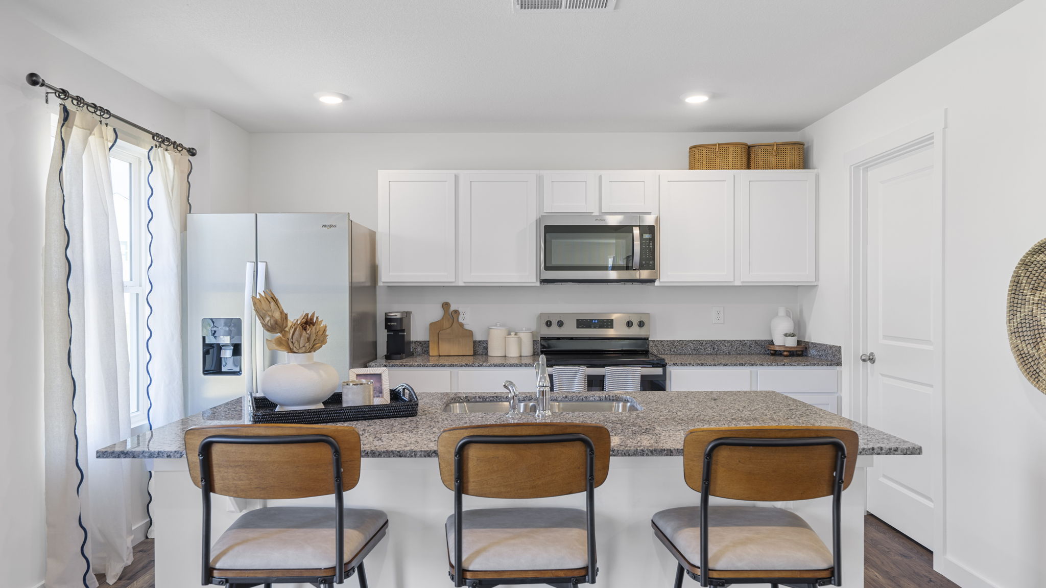 kitchen with large island and bar seating