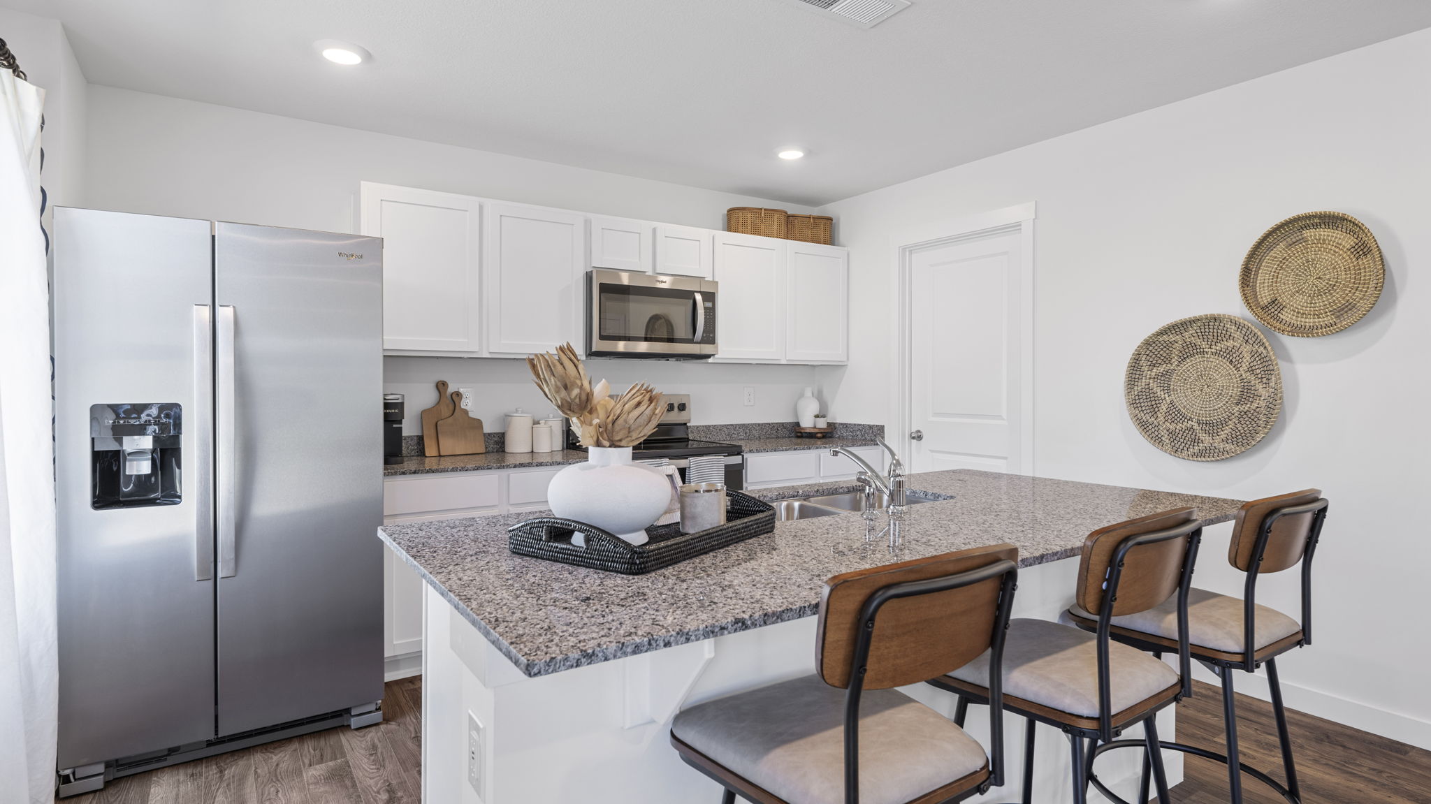 kitchen with large island and bar seating