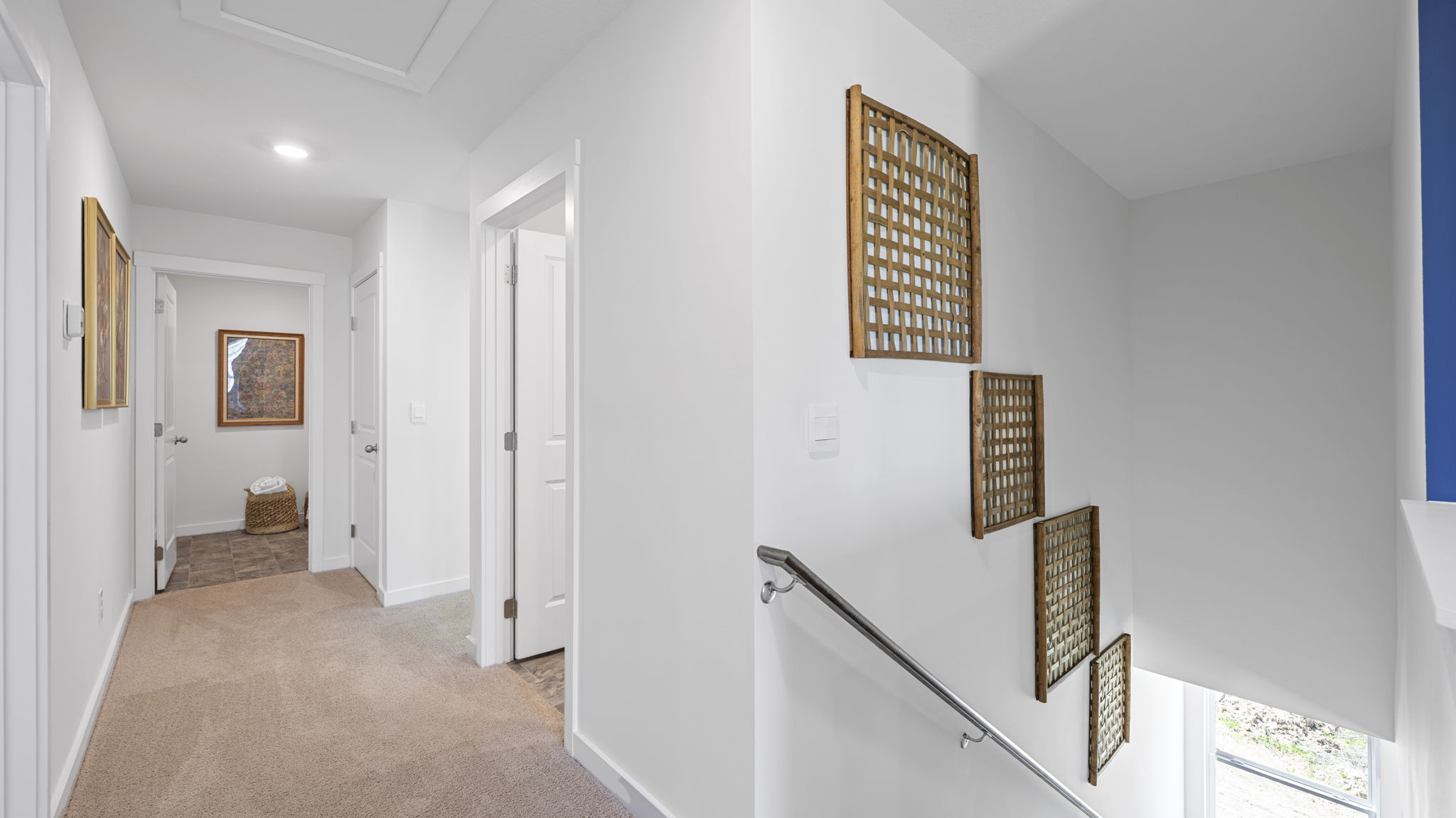 upstairs hallway with carpet