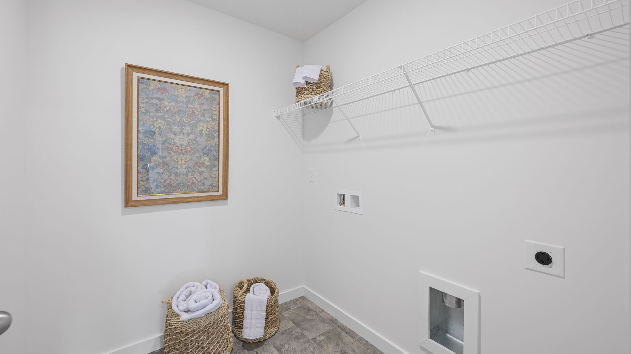 laundry room with shelving
