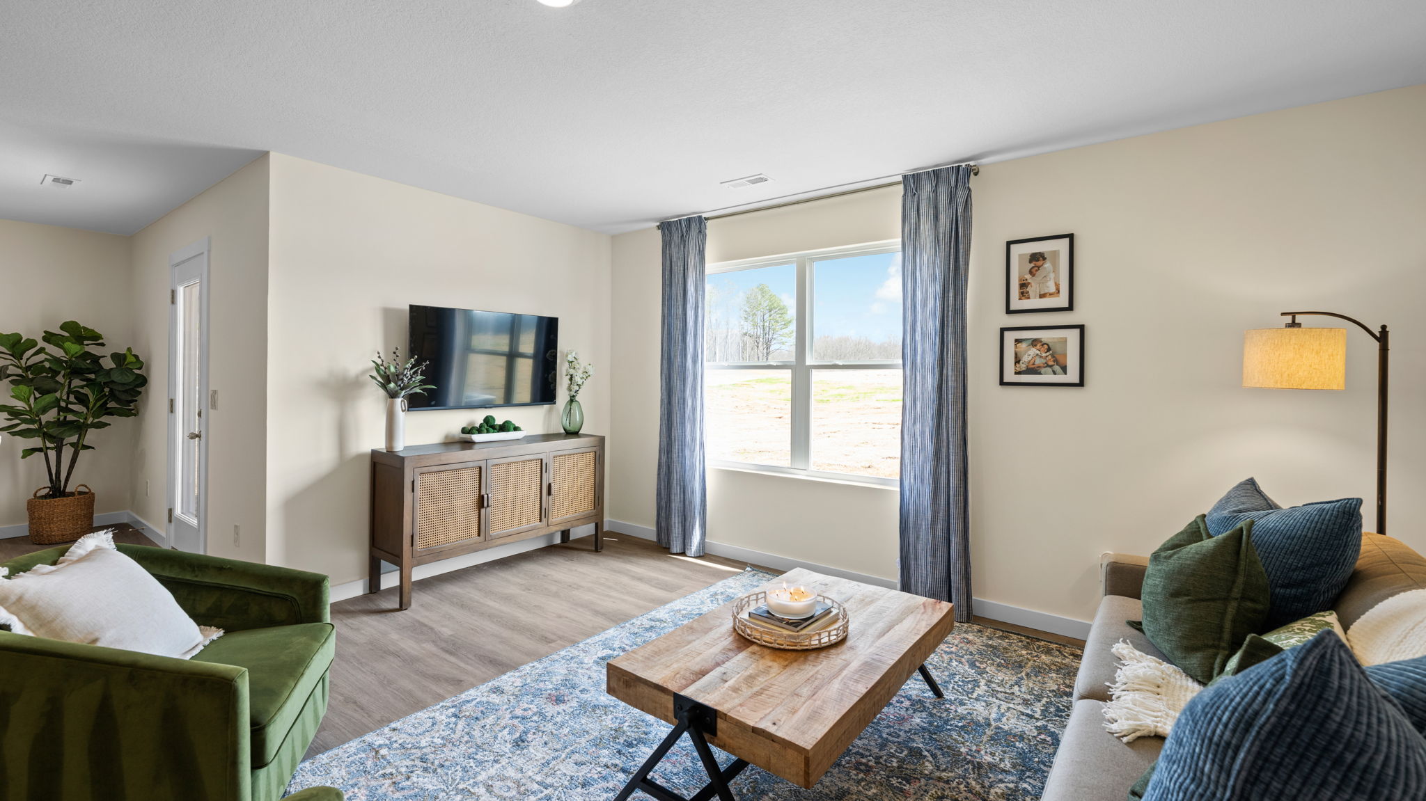 open concept living area with double window