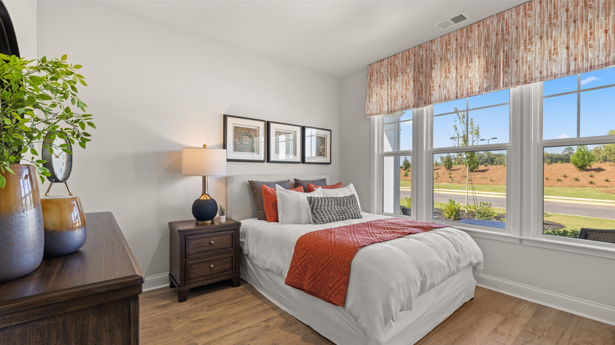 bedroom with triple window