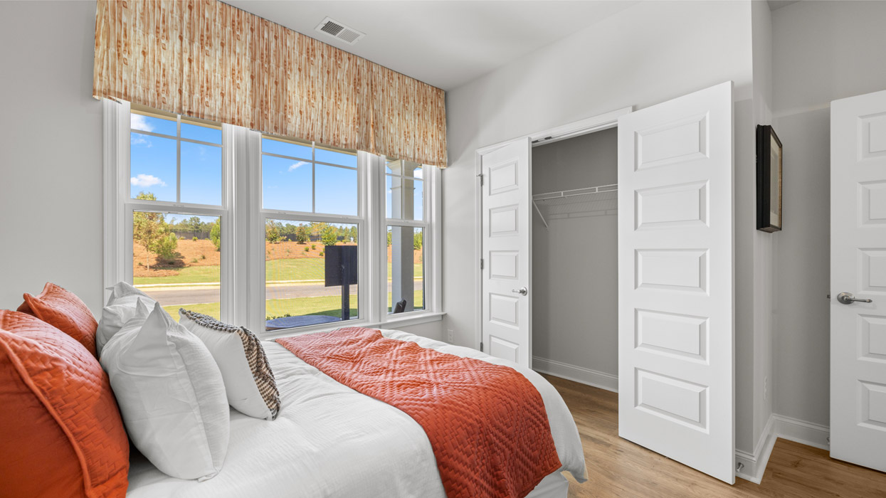 bedroom with furniture and closet