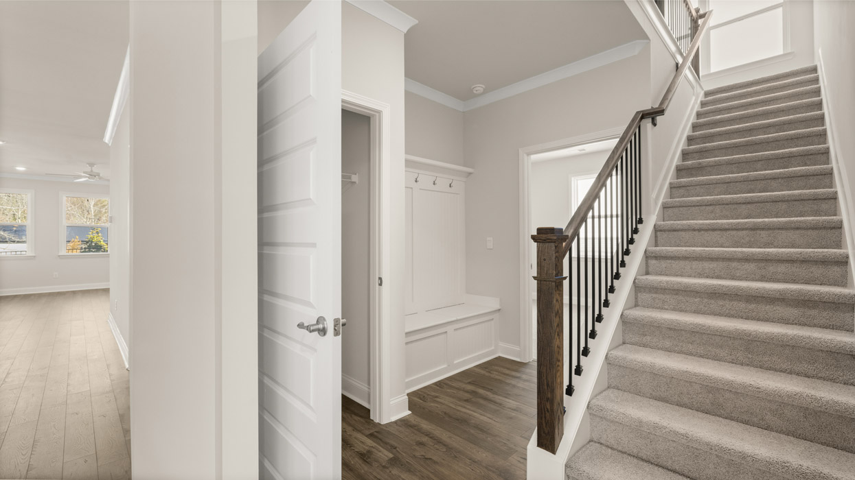entryway hallway with stairs leading to second floor