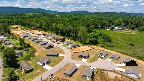 Aerial photo of Lake Terrace community with mountains in the background