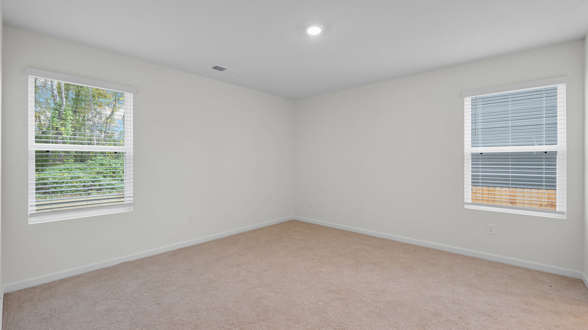 primary bedroom off kitchen