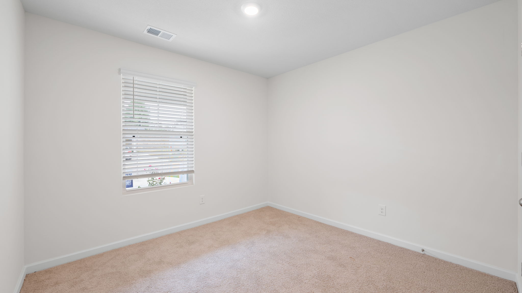 the bedroom exterior has lots of natural light