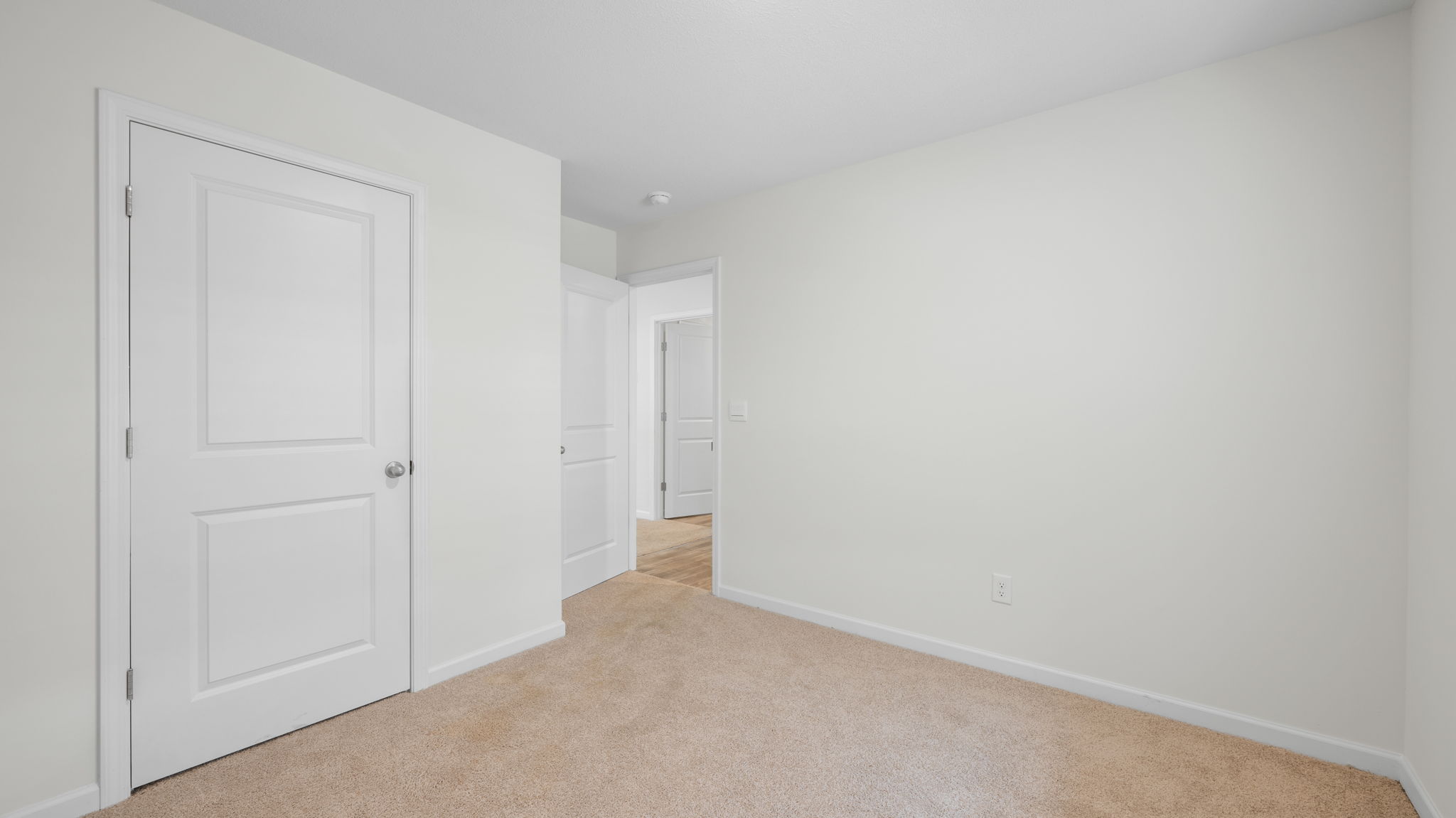 bedroom has carpet and closer